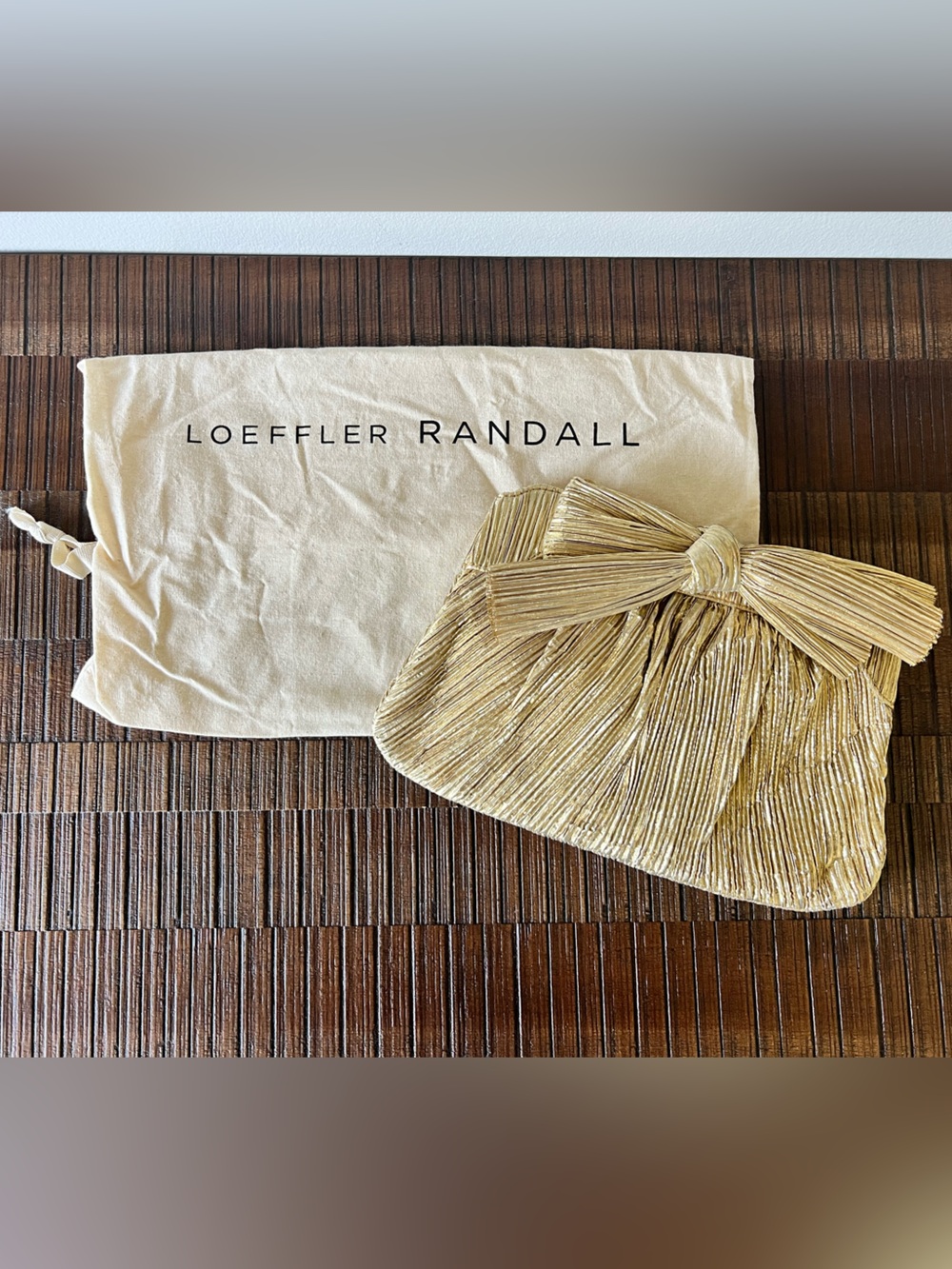 Loeffler Randall Rayne Pleated Bow Clutch in Gold,